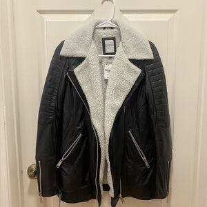 Carmar Black Leather jacket.